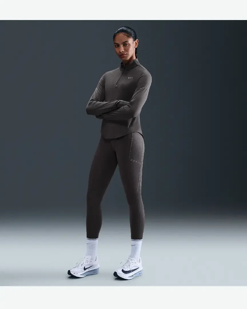 Collant 7/8 taille haute avec poches Nike Swift Femme