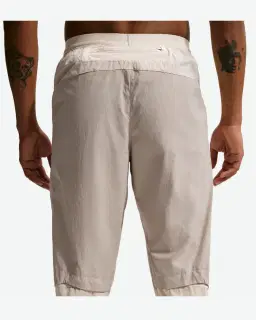Pantalon tissé déperlant Nike Stride Homme – 3/4