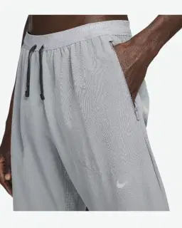 Pantalon tissé Dri-FIT Nike Phenom Homme – 3/4