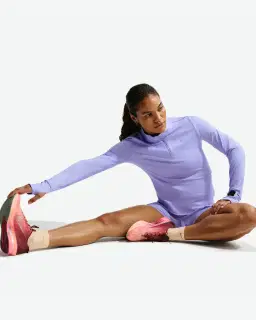 Pull 1/4 zip anti-UV Dri-FIT Nike Swift Femme – 3/4