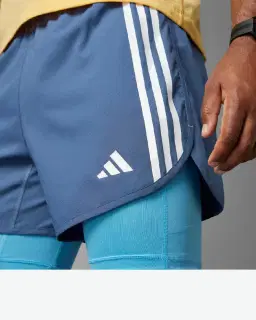 short adidas 2-en-1 own the run 3 bandes Homme – 3/4