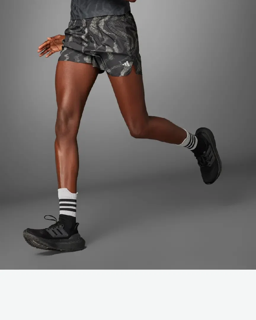 short adidas réfléchissant ultimate wind rdy Femme