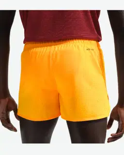 Short avec sous-short intégré 8 cm Dri-FIT Nike Fast Homme – 3/4
