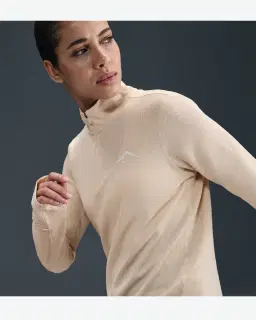 Tee-shirt deuxième couche Dri-FIT à 1/4 de zip Nike Trail Femme – 3/4