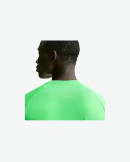 Tee-shirt d'hiver à manches courtes Dri-FIT Nike Stride Homme – 3/4
